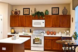Upgraded Kitchen with Stainless Steel appliances and granite worktops.
