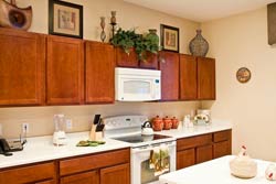 Upgraded Kitchen with Stainless Steel appliances and granite worktops.